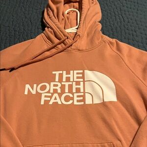 The North Face women’s pink peach hoodie